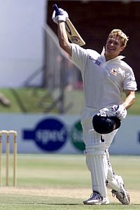  Mar 2002: Shane Watson of Australia celebrates reaching his century during the South Africa A v Australia match
                                               played in Port Elizabeth, South Africa
